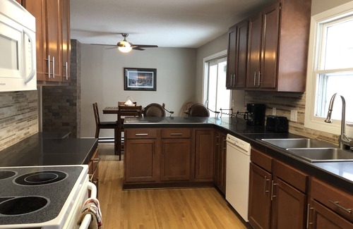 White Bear Lake House | Charming cottage with views from the porch of Birch Lake near White Bear Lake Mn