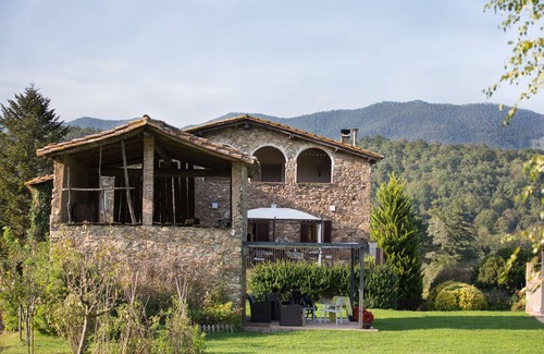 La Vall de Bianya House | Charming farmhouse with views, large garden, private pool, pet-friendly
