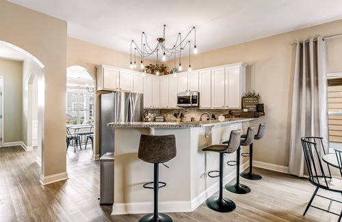 Port Wentworth House | Charming, immaculate coastal home with furnished porches, AC, & washer/dryer