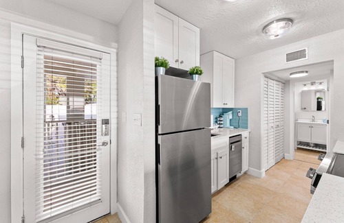 Pass-a-Grille Historic District Condo | Charming Pass-a-Grille beachfront condo, St. Pete Beach, heated pool, laundry