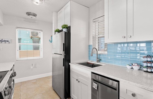 Pass-a-Grille Historic District Condo | Charming Pass-a-Grille beachfront condo, St. Pete Beach, heated pool, laundry
