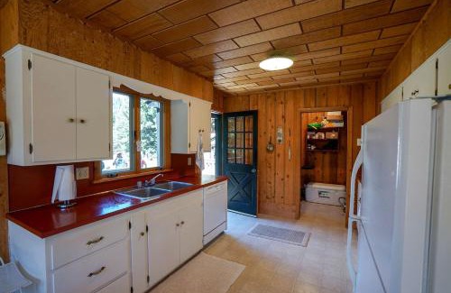 Cameron House | Charming Riverside Cabin with Deck Overlooking Madison River near Three Dollar Bridge in McAllister, Montana
