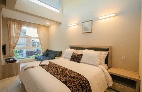 Pemecutan Kelod Apartment | Charming studio in Central Point B