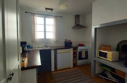 Estreito da Calheta House | Charming three bedroom cottage with a pretty garden and free private parking