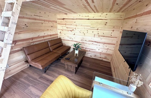 Isabella Cabin | Charming Tiny home cabin with double loft