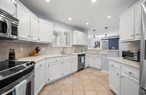 Palm Valley House | Charming Townhome with Patio, Firepit- Close to Golf + Beach