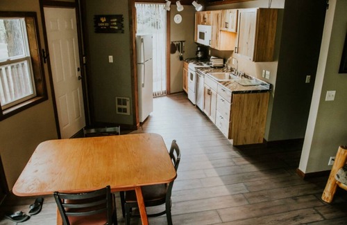 Puposky Cabin | Charming Up North Octagon Cabin - Private Beach & Resort Amenities