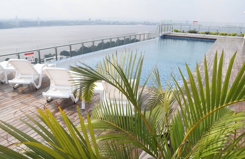 Gombe Apartment | Chic 1-bedroom apartment with balcony and rooftop Riverview pool gym and terrace