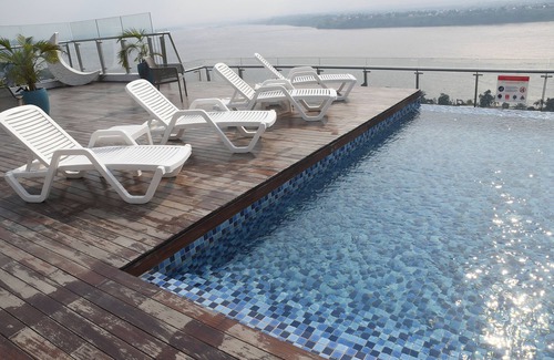 Gombe Apartment | Chic 1-bedroom apartment with balcony and rooftop Riverview pool gym and terrace