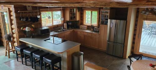 Kalispell House | Christy's Cottage, Waterfront w/Slide & Ice Shanty