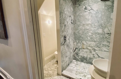 Lower Garden District Bed & Breakfast | Circa 1855 Lower Garden District Townhouse Courtyard 1st Floor