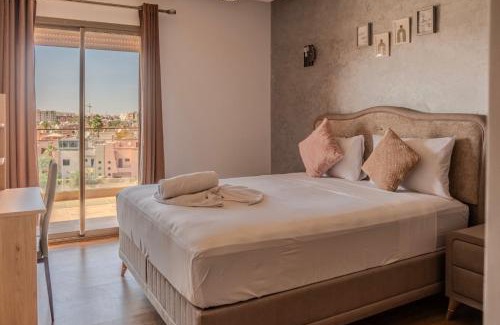 Gueliz Apartment | City Haven at Pearl Garden Pool and View