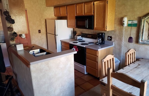 Moab South Valley Condo | Clean, Cozy, Convenient-On golf course; Ride out of garage to Trails/Petroglyphs