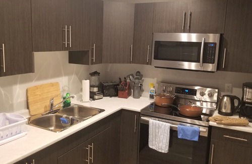 Saskatoon House | Clean, Cozy Pocket Friendly 2BR + A/C + Workspace + Ethernet & WiFi