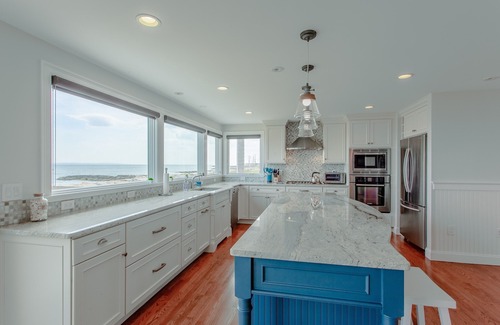 East Falmouth House | Coastal chic meets French Provençal in this newly renovated oceanfront home.