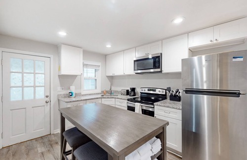 Kure Beach Cottage | Coastal cottage with short walk to the beach and fishing pier