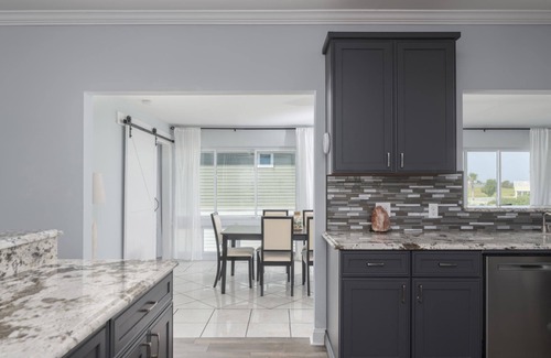 Beachwalk House | Coastal Home with Screened In Porch & Access to Harbor Island Amenities