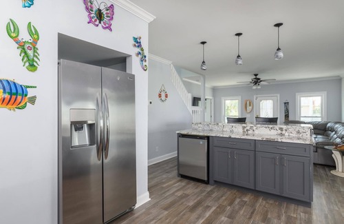 Beachwalk House | Coastal Home with Screened In Porch & Access to Harbor Island Amenities