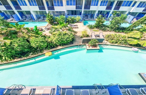 Port Douglas Apartment | Coastal Luxe Studio with Spa Bath + Lagoon Pool Views Short Walk to Beach!