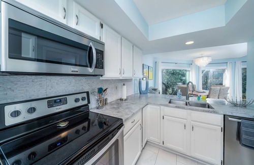 Spinnaker Beachhouses Villa | Coastal luxury at 774 Spinnaker-charming 2-BR villa in Seabrook Island, steps from beach and golf.