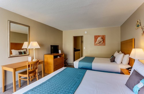 Fernandina Beach Hotel | Come relax in the gentle ocean breeze at the only oceanfront motel on Amelia Island, FL. Our rooms provide a clear view of the ocean, as well as, direct access to the Atlantic Ocean. No streets to cross or cars to dodge, just you, your family, and th