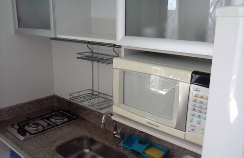 Santo Agostinho Apartment | Comfort in Lourdes, 1 block from Diamond Shopping Center, 1 parking space/garage and laundry room