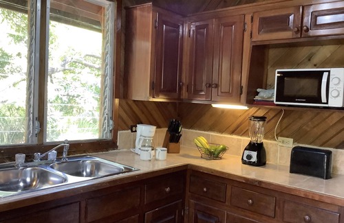 Antoneys Cay Cottage | Comfortable 2 bedroom cabana, steps from the Caribbean sea.