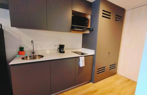 Centro International Apartment | Comfortable apartment with private terrace. Bogota International Center.