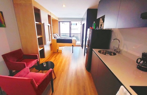 Centro International Apartment | Comfortable apartment with private terrace. Bogota International Center.