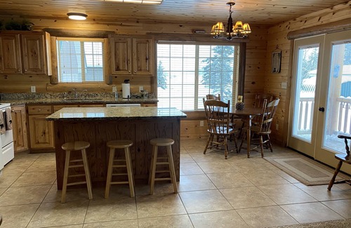 Last Chance Cabin | Comfortable cozy cabin, accessible to Snowmobile & ATV trails & Fly Fishing