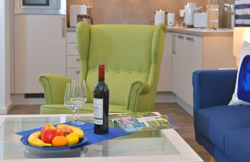 Ralswiek Apartment | Comfortable vacation apartment with sea view and terrace in the Blue House in Ralswiek