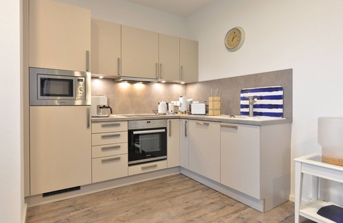 Ralswiek Apartment | Comfortable vacation apartment with sea view and terrace in the Blue House in Ralswiek