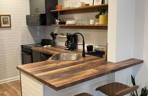 Daphne Condo | Completely remodeled studio condo with a pool view. Convenient location!