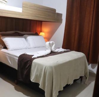 Praia do Morro Apartment | CONFORTO IMBATIVEL - 25 metros do MAR - 2 Quartos com AR CONDICIONADOS SPLIT, Air Fryer, WI-FI, Disney Plus, Star Plus, HBO Max, Guarda Sol, Cadeiras de Praia e Caixa Térmica - 8 pessoas com Muito Conforto - Melhor Localização!