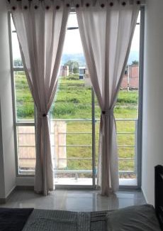 Carmen de Apicala House | conjunto residencial aquapark las tres palmas