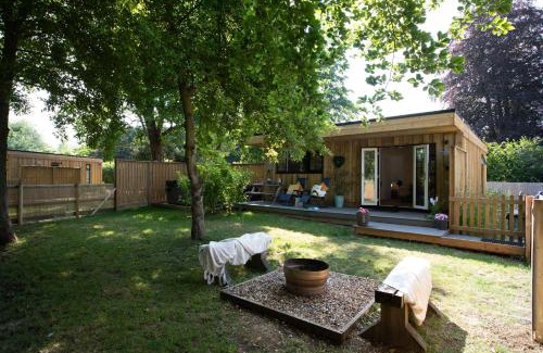 Toppesfield House | Copper Beech Lodge with Hot Tub, Games Room, Fire Pit