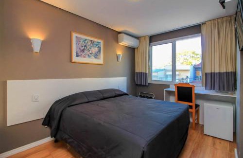 Menino Deus Hotel | CORAL EXPRESS Prox Anfiteatro Por do Sol , Araújo Vianna e Pucrs , 5 klm de distancia