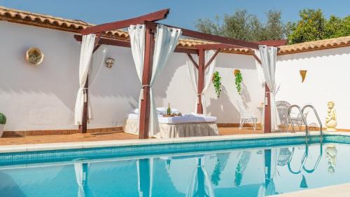 Penaflor Villa | Cortijo Los Mellizos Penaflor by Ruralidays