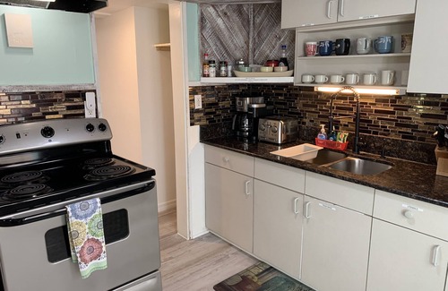 Clearwater Beach Cottage | Cottage on the beach! 30 second walk away! Heated pool on the property!