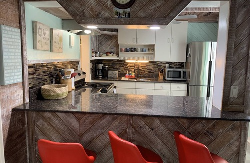 Clearwater Beach Cottage | Cottage on the beach! 30 second walk away! Heated pool on the property!