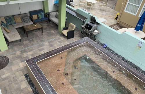 Clearwater Beach Cottage | Cottage on the beach! 30 second walk away! Heated pool on the property!