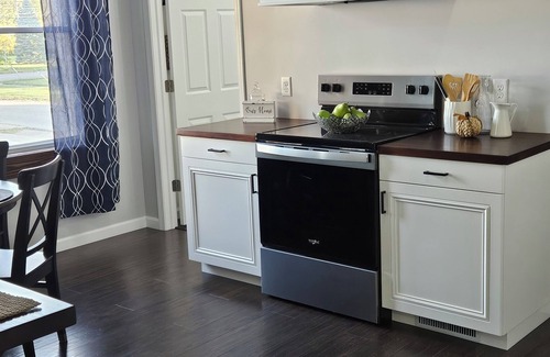 Fostoria Apartment | Country charm and modern finishes with beautiful open living and dining areas