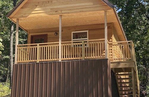 Winslow Cabin | Cowboy Cabin is a quiet place to camp in the woods with the amenities of home.