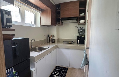 San Bartolome Condo | Cozy 1-bedroom condo with AC and WiFi in enjoyable Quezon City
