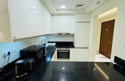 Sheikh Zayed Road Apartment | Cozy 2-bedroom apartment in beautiful Dubai with WiFi, AC