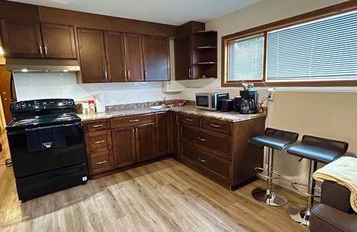 Kamloops House | Cozy 3 bedroom family friendly suite with breathtaking views of mountains.