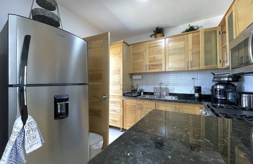 Guaricano Apartment | Cozy Apartment with Pool View 10 minutes USA Embassy