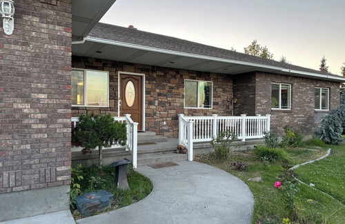 Rexburg House | Cozy bedroom in peaceful house in Rexburg with WiFi, AC and shared living space.
