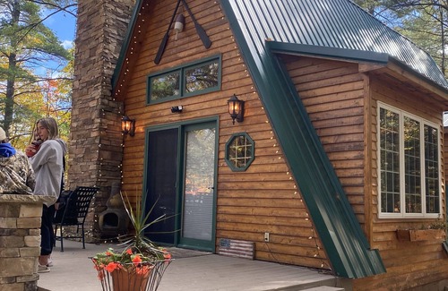 Paradise Cabin | Cozy Cabin nestled in the woods on all season road seconds from the trail system