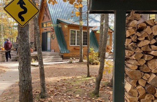 Paradise Cabin | Cozy Cabin nestled in the woods on all season road seconds from the trail system